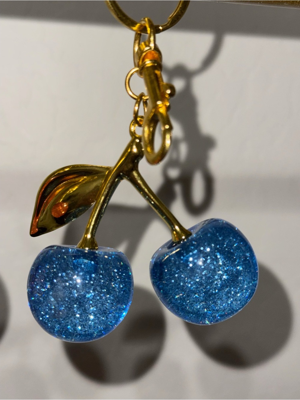 Gold Cherry Pendant Necklace with Sparkling Blue Cherries